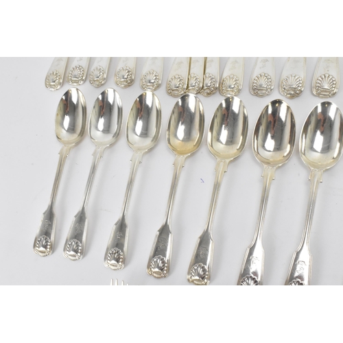 29 - A collection of Victorian cutlery in the fiddle, thread & shell pattern, with various dates and make... 