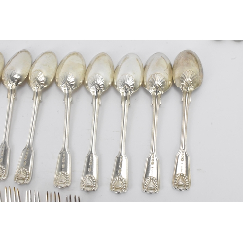 29 - A collection of Victorian cutlery in the fiddle, thread & shell pattern, with various dates and make... 