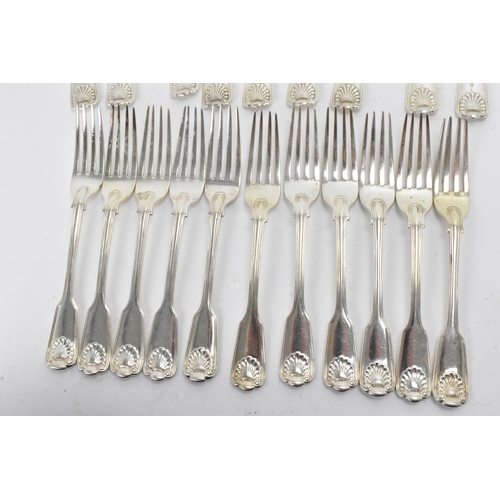 29 - A collection of Victorian cutlery in the fiddle, thread & shell pattern, with various dates and make... 