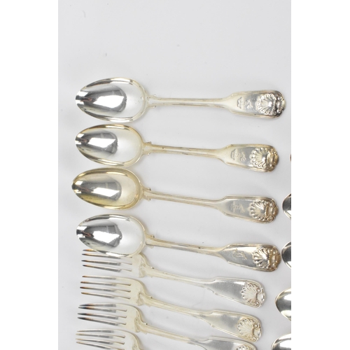 29 - A collection of Victorian cutlery in the fiddle, thread & shell pattern, with various dates and make... 