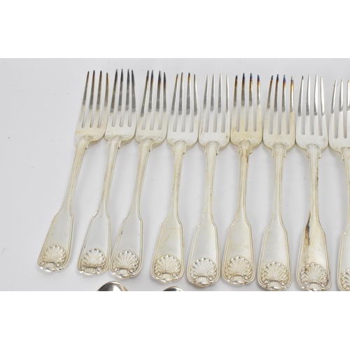 29 - A collection of Victorian cutlery in the fiddle, thread & shell pattern, with various dates and make... 