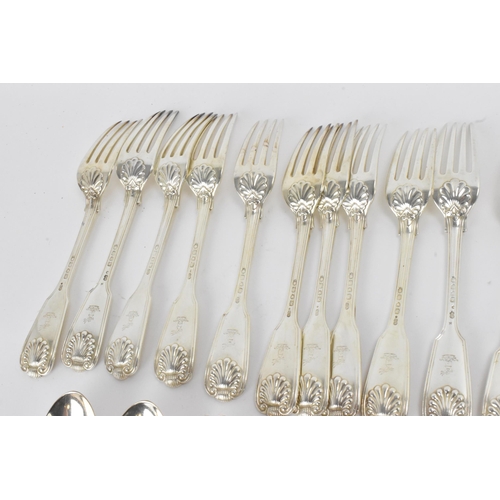 29 - A collection of Victorian cutlery in the fiddle, thread & shell pattern, with various dates and make... 