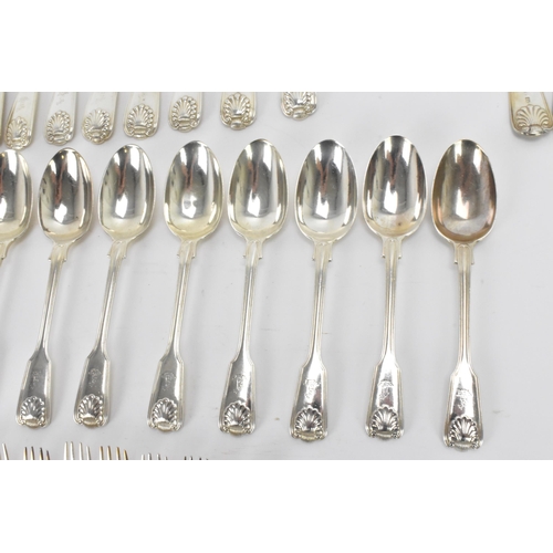 29 - A collection of Victorian cutlery in the fiddle, thread & shell pattern, with various dates and make... 