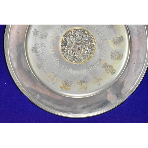 3 - An Elizabeth II silver commemorative dish, Birmingham 1977, with central raised gilt roundel with co... 