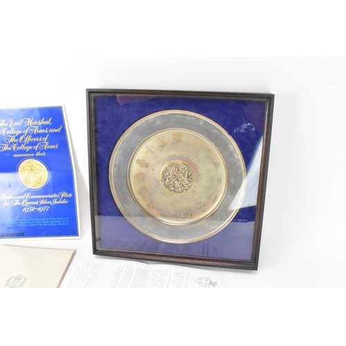 3 - An Elizabeth II silver commemorative dish, Birmingham 1977, with central raised gilt roundel with co... 