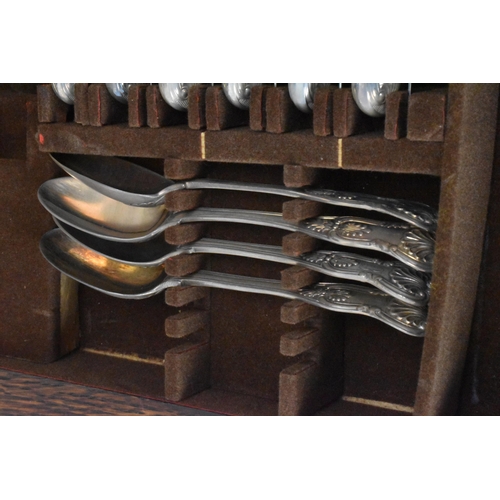 4 - A canteen of silver cutlery in the Kings pattern,  with various dates and makers, comprising nine te... 