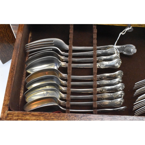 4 - A canteen of silver cutlery in the Kings pattern,  with various dates and makers, comprising nine te... 