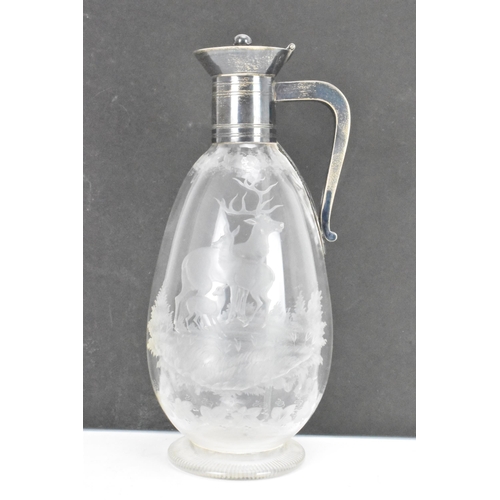 44 - A Victorian silver claret jug by John Grinsell & Sons, hallmarked Birmingham 1877, the silver top of... 