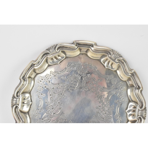 46 - An Edwardian silver card tray by Joseph Rodgers & Sons, hallmarked Sheffield 1901, having a floral a... 