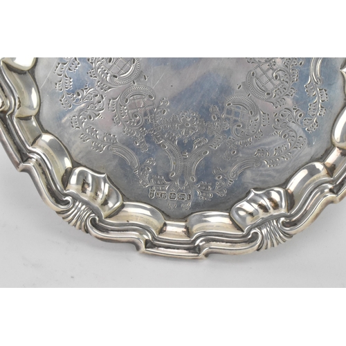 46 - An Edwardian silver card tray by Joseph Rodgers & Sons, hallmarked Sheffield 1901, having a floral a... 