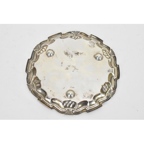 46 - An Edwardian silver card tray by Joseph Rodgers & Sons, hallmarked Sheffield 1901, having a floral a... 