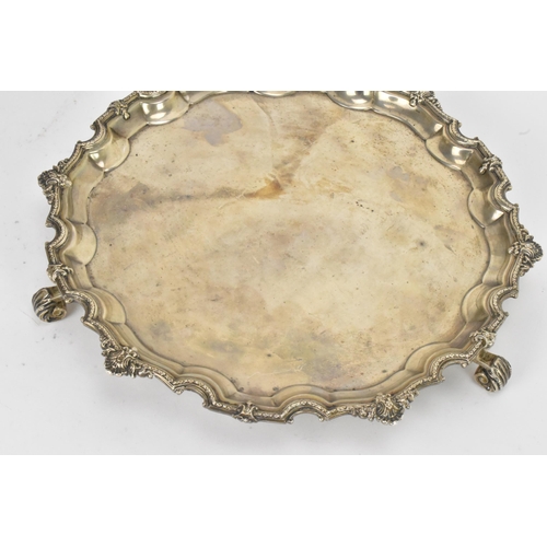 47 - A George V silver salver by Adie Brothers, hallmarked Birmingham 1931, having a Chippendale rim with... 