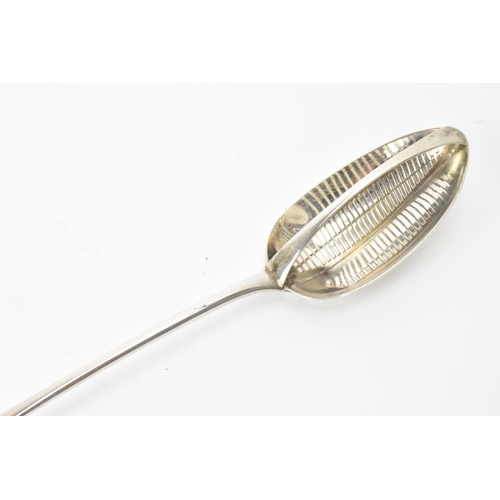 5 - A George III silver gravy strainer spoon, by George Smith (III) & William Fearn, London 1790, engrav... 