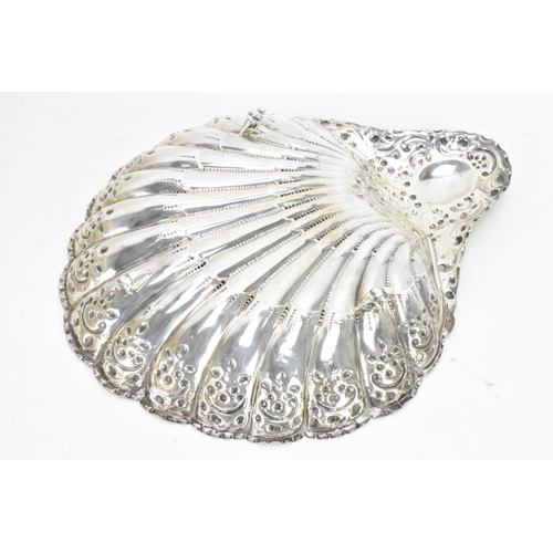 54 - A Victorian silver shell shaped serving dish by Atkin Brothers, hallmarked Sheffield 1892, having a ... 