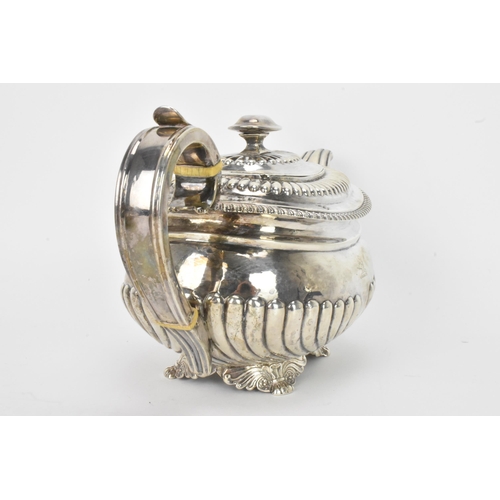 6 - A George III silver teapot, by Alice & George Burrows II, hallmarked London 1814, having a reeded bo... 