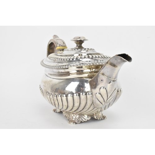 6 - A George III silver teapot, by Alice & George Burrows II, hallmarked London 1814, having a reeded bo... 