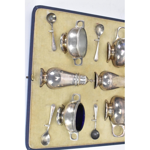 60 - A George V silver cased cruet set by Mappin & Webb, hallmarked Birmingham 1928, consisting of two mu... 