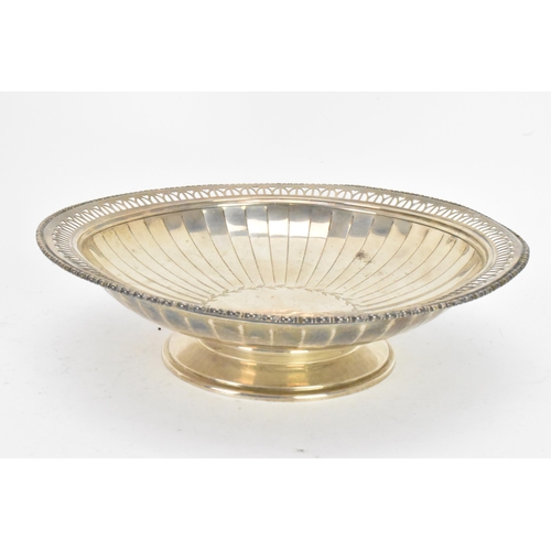 61 - A George V silver bowl by Mappin & Webb, hallmarked Sheffield 1931, engraved with a circular wreath ... 