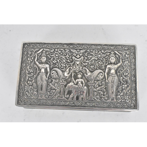 62 - An early/mid 20th century Indian silver cigarette box, the lid and side panels embossed with scenes ... 