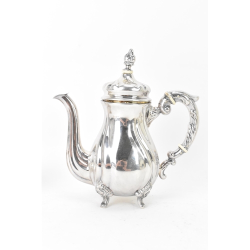 65 - An early 20th century sterling silver three piece coffee set, comprising of a coffee pot, cream jug,... 