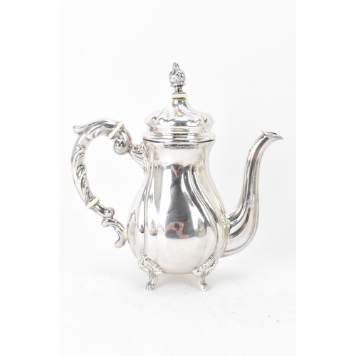 65 - An early 20th century sterling silver three piece coffee set, comprising of a coffee pot, cream jug,... 