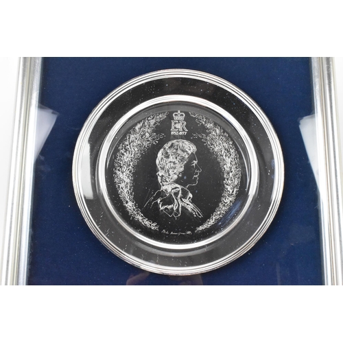 69 - An Elizabeth II silver limited edition royal commemorative silver salver, engraved with Queen Elizab... 