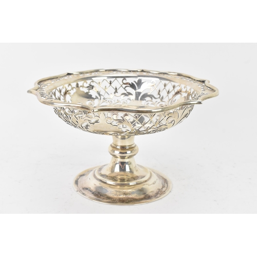 74 - An Edwardian silver raised dish, by Copper Bros & Sons Ltd, hallmarked Sheffield 1907, having a shap... 