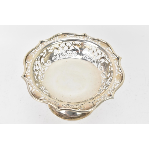 74 - An Edwardian silver raised dish, by Copper Bros & Sons Ltd, hallmarked Sheffield 1907, having a shap... 