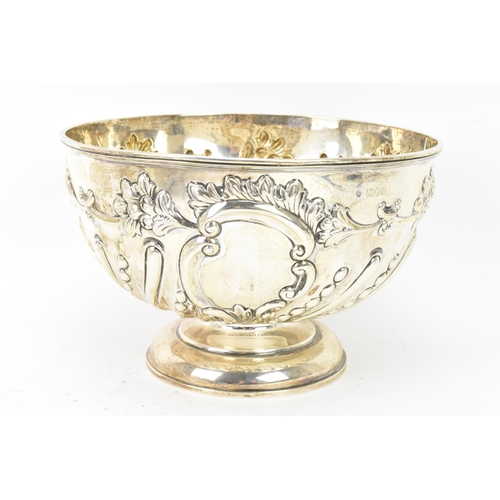 75 - An Edwardian silver bowl by William Hutton & Sons Ltd, hallmarked London 1906, embossed with flowers... 