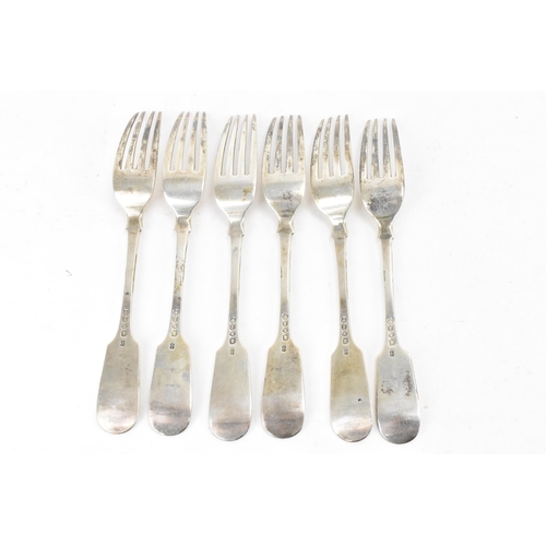 83 - A Victorian set of six silver table forks by Henry Wilkinson & Co, hallmarked London 1862, each in t... 