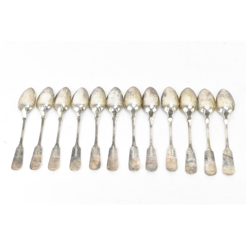 86 - A William IV set of twelve silver teaspoons, hallmarked Edinburgh 1835, each in the fiddle and shell... 