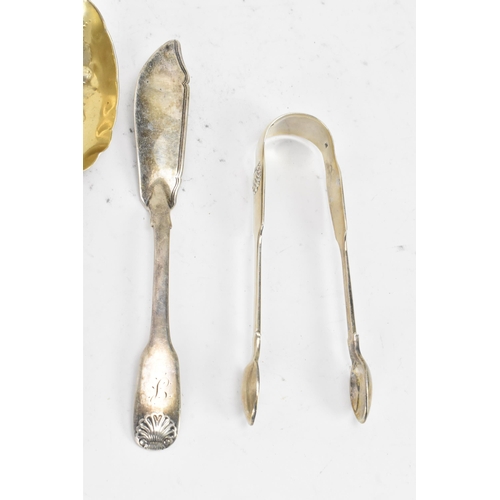 88 - A selection of 19th century silver cutlery to include a George III fish slice by Thomas Dicks hallma... 