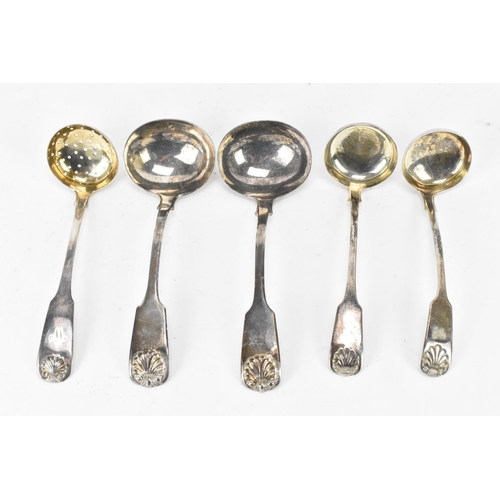 89 - Four 19th century silver sauce ladles and a sugar sifter spoon all in the fiddle and shell pattern, ... 