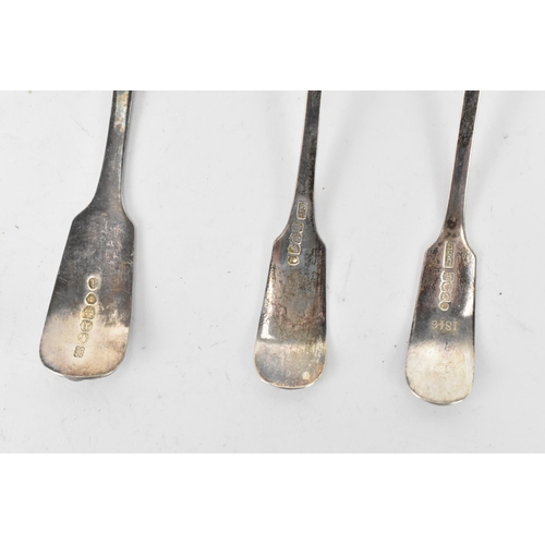 89 - Four 19th century silver sauce ladles and a sugar sifter spoon all in the fiddle and shell pattern, ... 