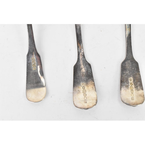 89 - Four 19th century silver sauce ladles and a sugar sifter spoon all in the fiddle and shell pattern, ... 