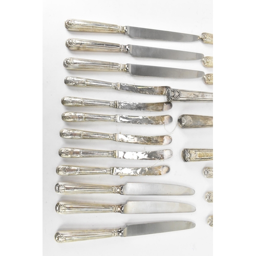 91 - A selection of 19th century and later silver handled cutlery to include a carving steel and knife by... 