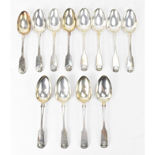 93 - A Victorian set of twelve silver dessert spoons by Lister & Sons, hallmarked Newcastle 1843, each in... 