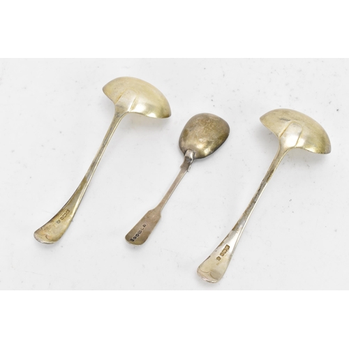 95 - An Edwardian pair of silver sauce ladles together with a Victorian small serving spoon, the ladles b... 