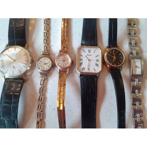 160 - A quantity of 20th Century watches to include Sekonda, DKNY, Mortina, Skagen, a Smiths Astral rolled... 