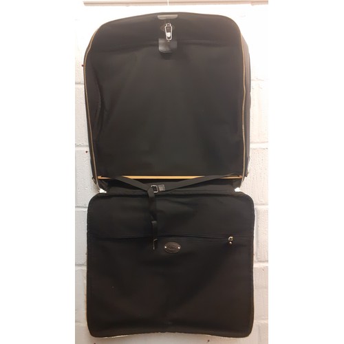 55 - Brics-A large black textured leather folding suit carrier/weekend bag 18