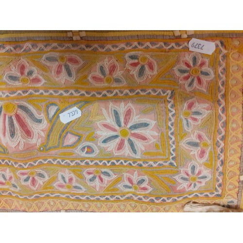 129 - A group of five 20th Century traditional Indian hand embroidered window valances, all measuring betw... 