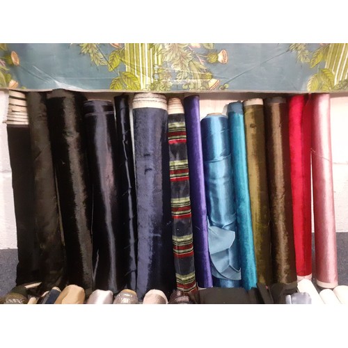 125 - A quantity of vintage short width fabrics (40cm average width) to include satin and brushed silk tog... 