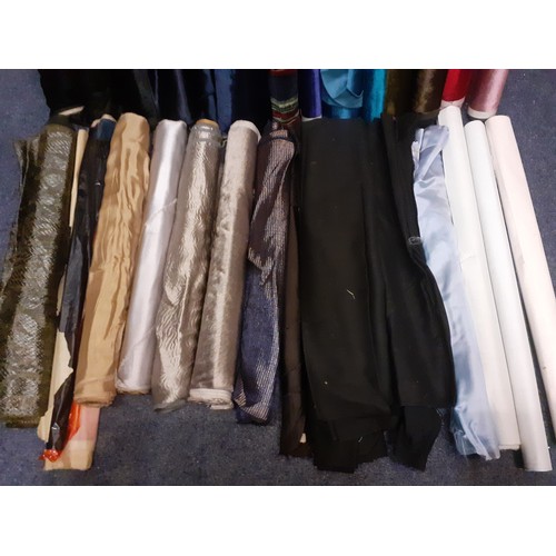 125 - A quantity of vintage short width fabrics (40cm average width) to include satin and brushed silk tog... 