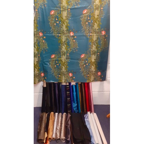 125 - A quantity of vintage short width fabrics (40cm average width) to include satin and brushed silk tog... 