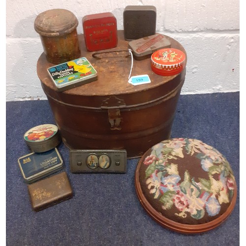 159 - A Victorian tin hat box, a quantity of vintage tins, a vintage sewing box with contents and a tapest... 