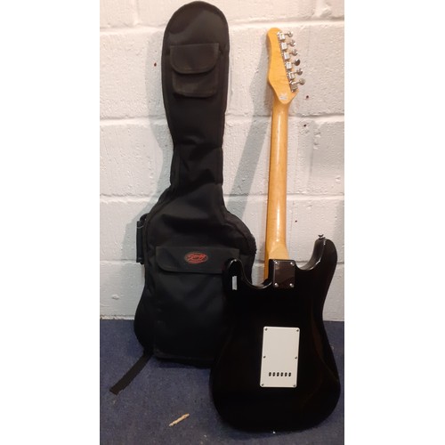 196 - A Gould electric 6-string guitar (one missing) in black with white fret and Stagg cloth travel bag. ... 