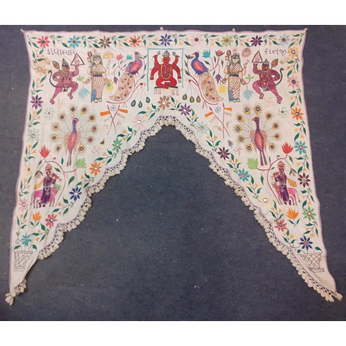 129 - A group of five 20th Century traditional Indian hand embroidered window valances, all measuring betw... 