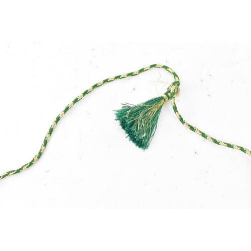 267 - An emerald coloured bead necklace comprising of four rows of emerald beads, knotted to a green and g... 