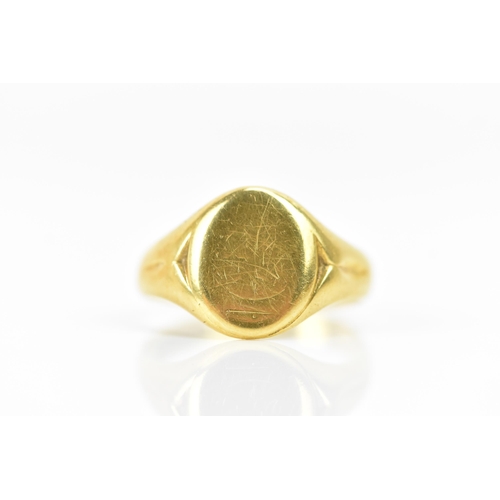 288 - An 18ct yellow gold gents signet ring, having incised shoulders and faded engraved initials, ring si... 