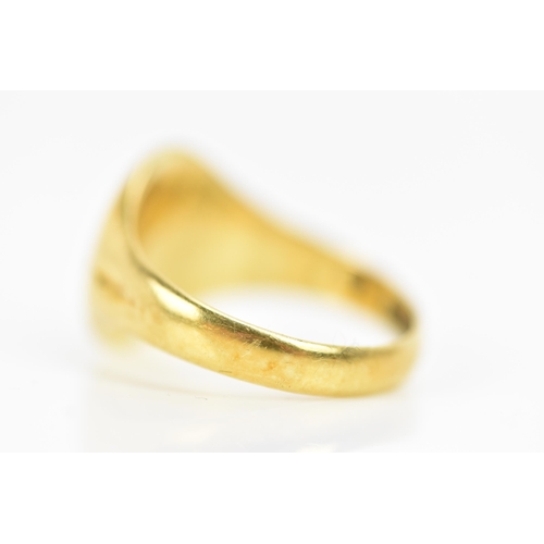 288 - An 18ct yellow gold gents signet ring, having incised shoulders and faded engraved initials, ring si... 